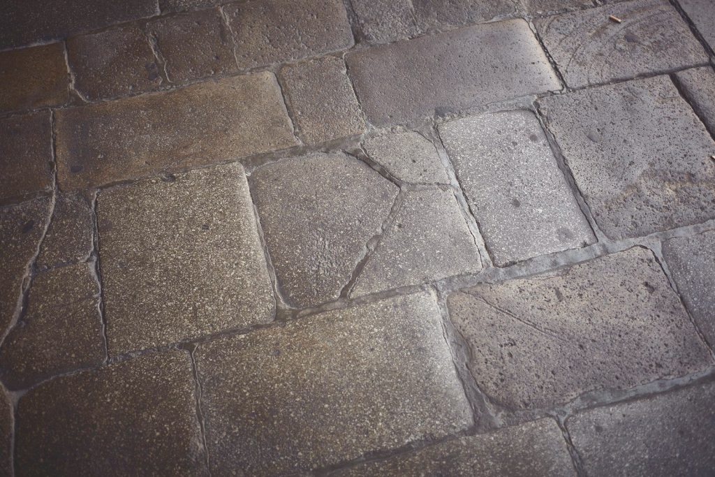 a close up view of a cobblestone street
